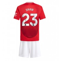 Camisa de time de futebol Manchester United Luke Shaw #23 Replicas 1º Equipamento Infantil 2024-25 Manga Curta (+ Calças curtas)